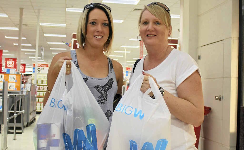 Rhiannon Lawson and Leanne Berry depart Big W with a swag of goodies during yesterday’s sale. Rhiannon Lawson and Leanne Berry depart Big W with a swag of goodies during yesterday’s sale.